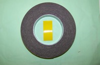Double-Sided Adhesive Foam Tape - Yellow Backing.  Designed for automotive trim fixing.  Delayed cure allows for repositioning where required.  25mm x 10m.